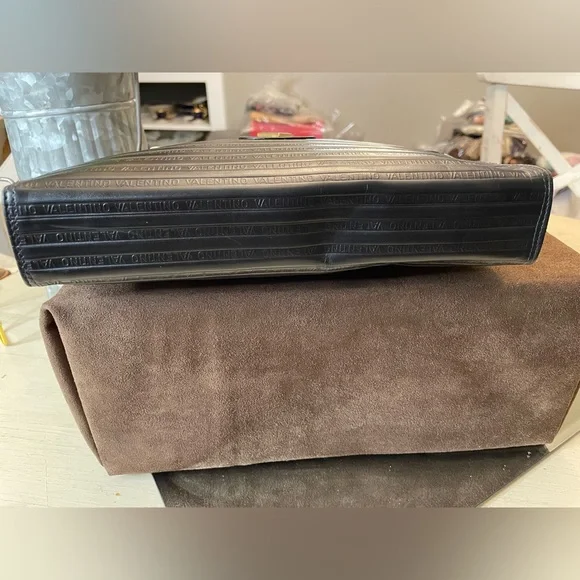 Mario Valentino Black and Gold Clutch with Elegant Wristlet